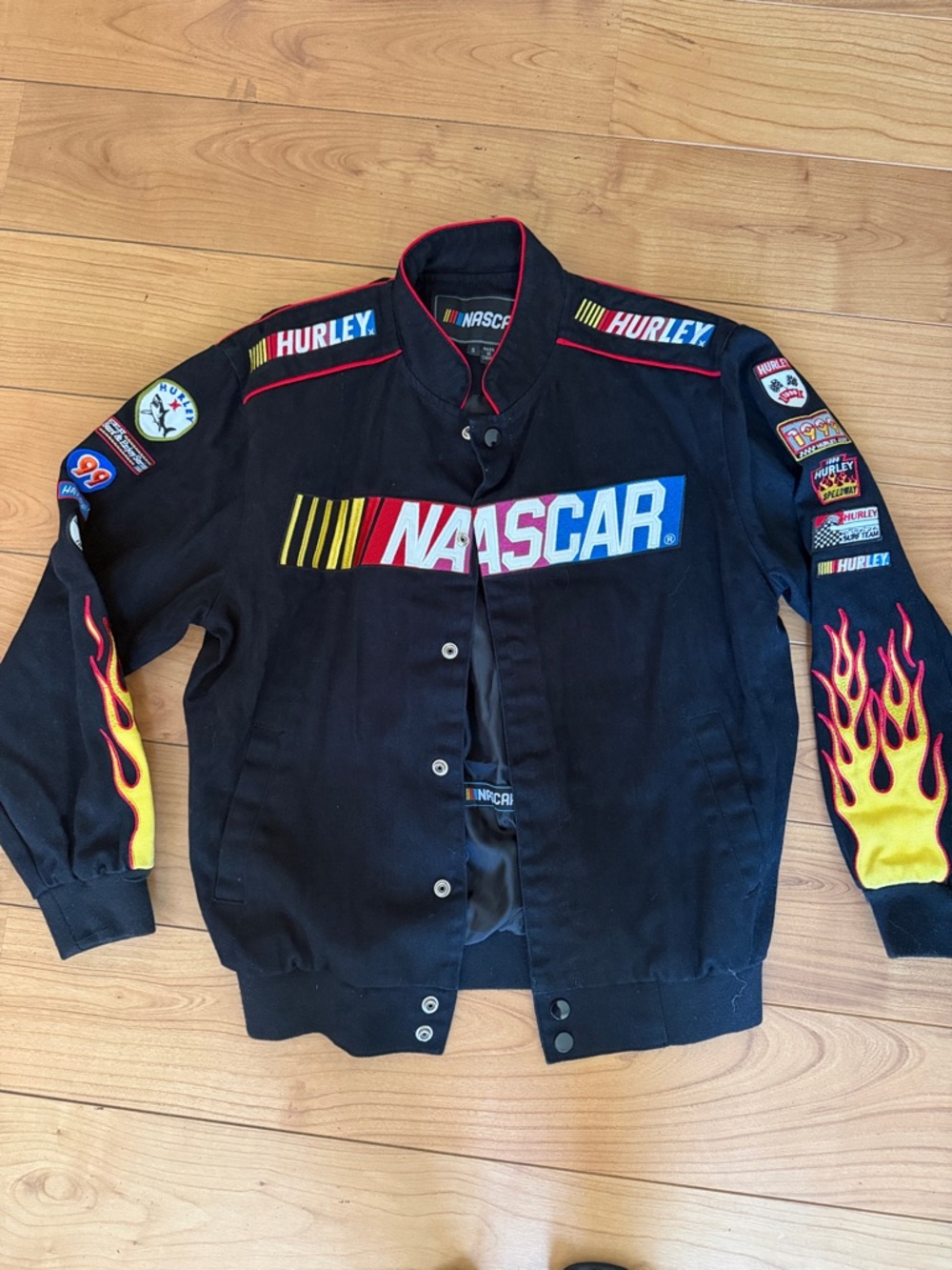Hurley Black NASCAR Jacket with Red and Yellow Flame Sleeves